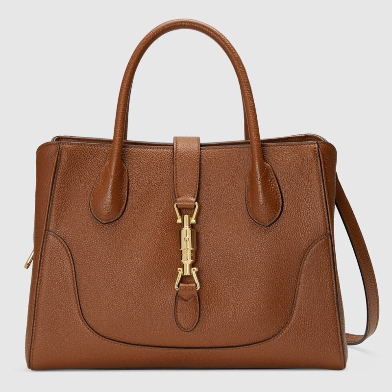 G*u*i shopping bags